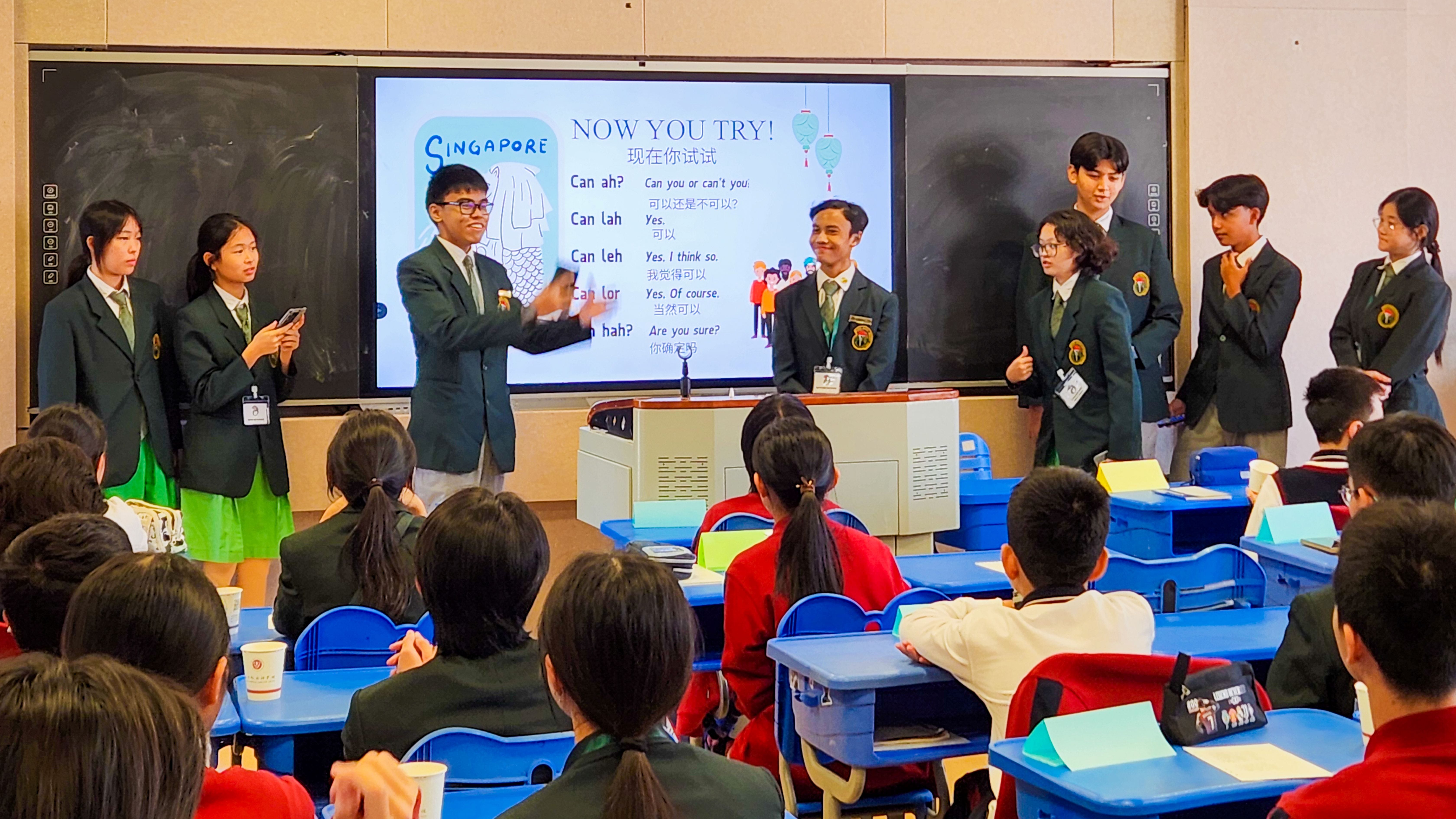 Photo of our students in an exchange programme overseas, teaching them our singaporean lingos.